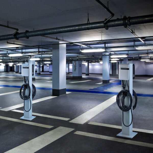 An underground garage with two EvoCharge stations.